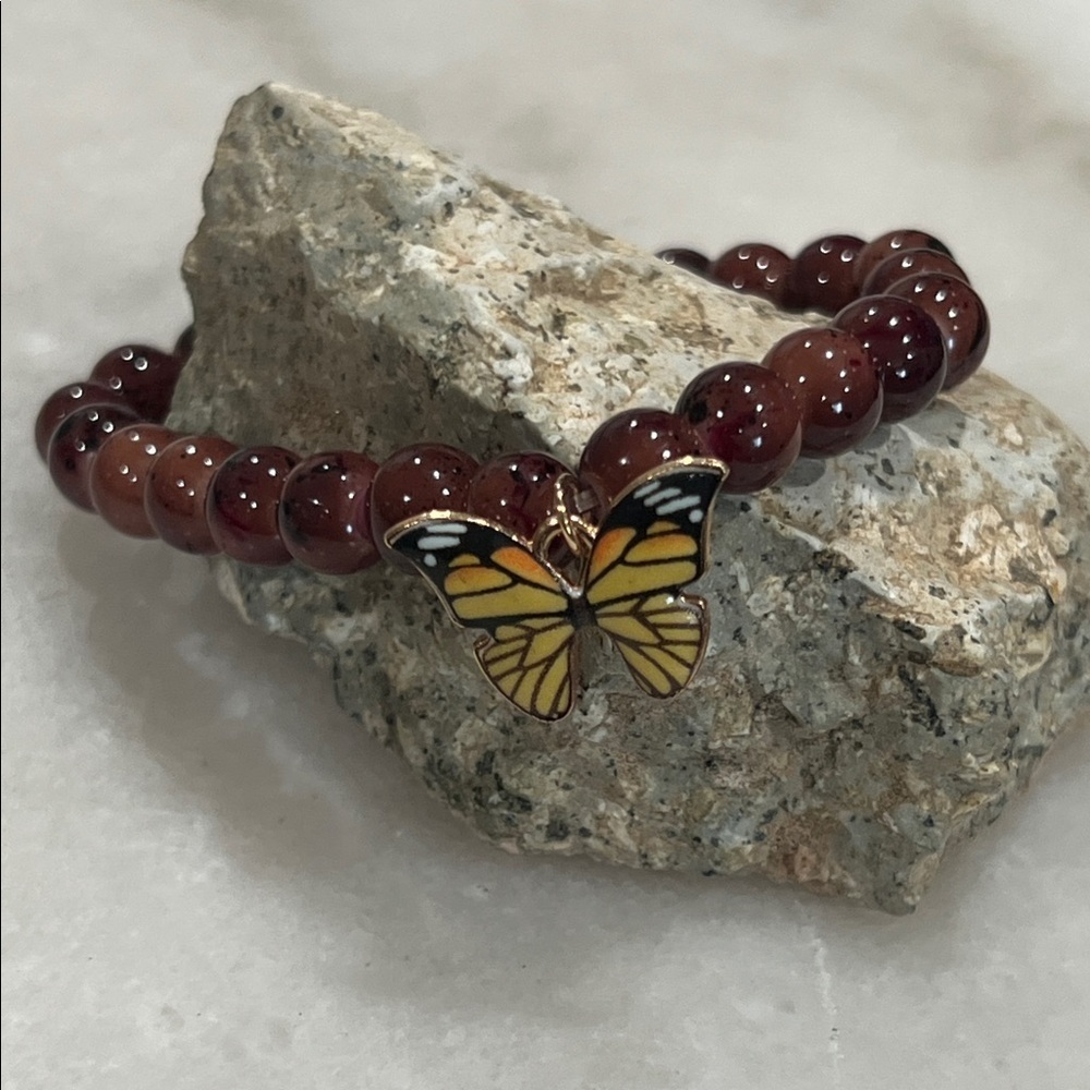 Elegant Brown Beaded Bracelet with Butterfly Charm